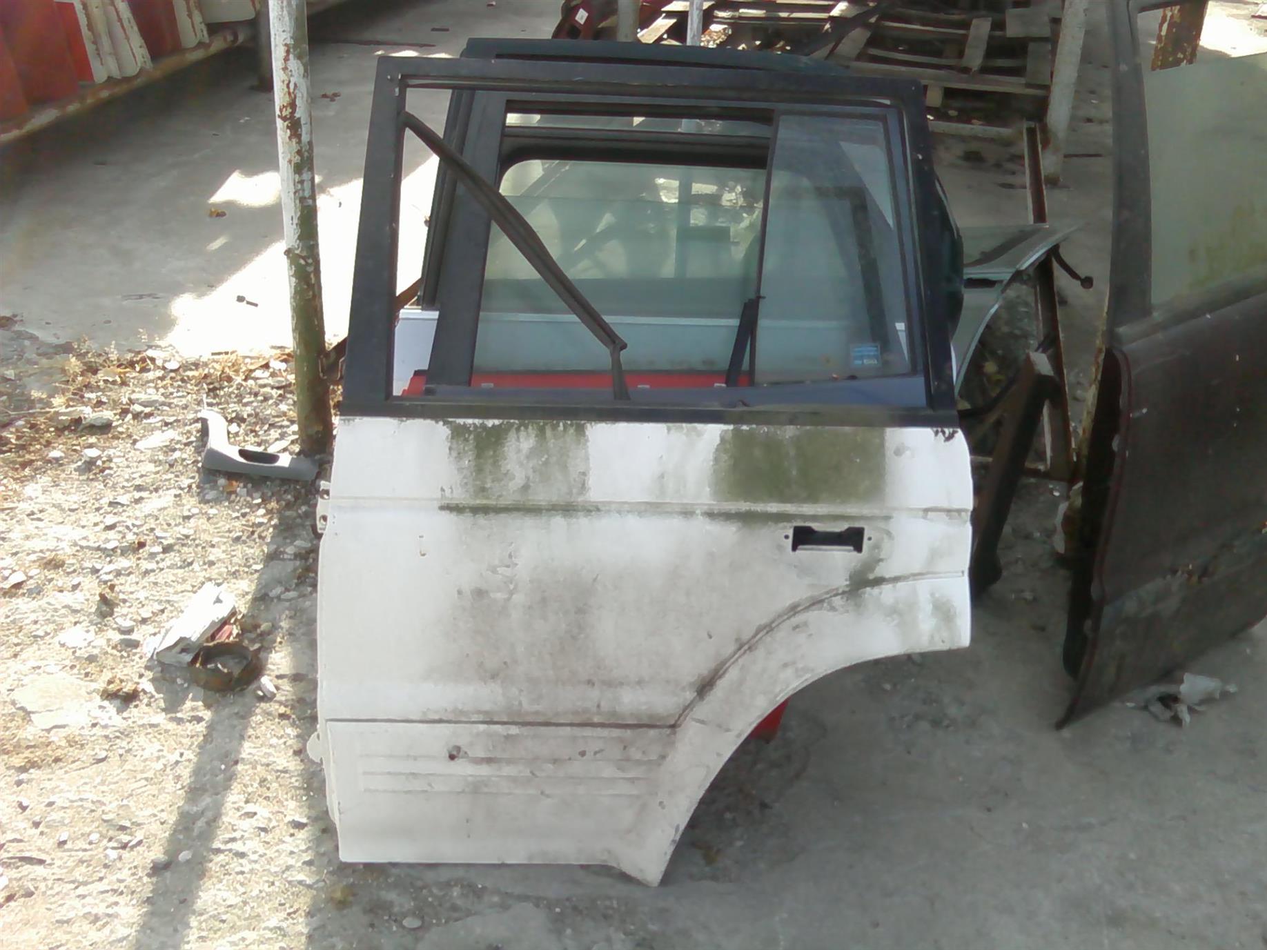 usa stanga spate goala Mitsubishi Pajero 2