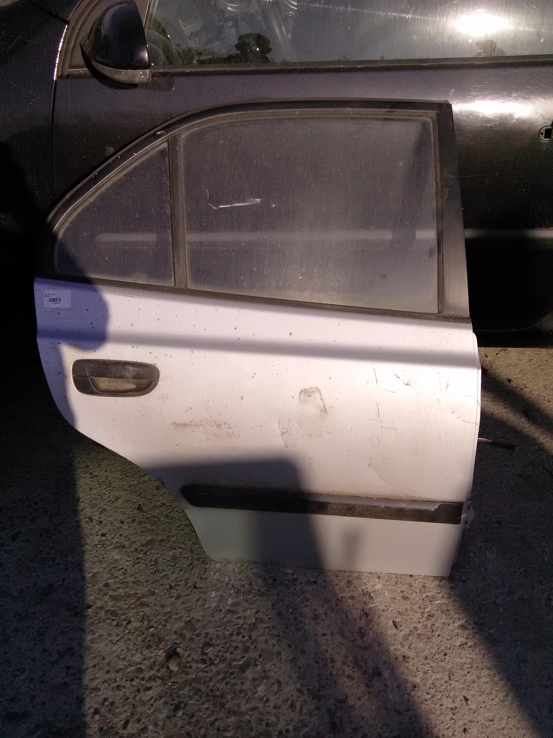 usa dreapta spate Hyundai Accent, an 2004
