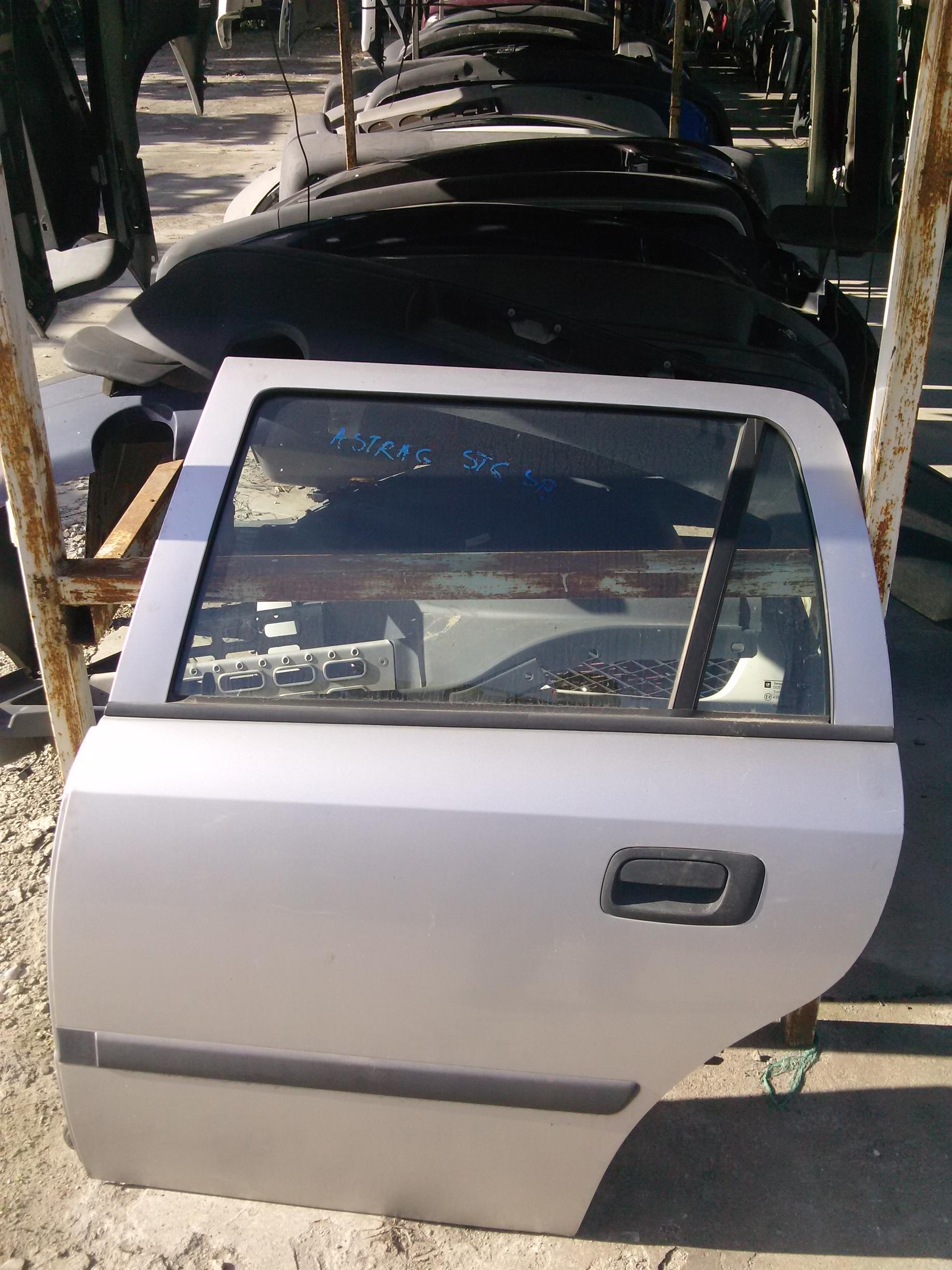Usa stanga spate Opel Astra G Hatchback, an 2003