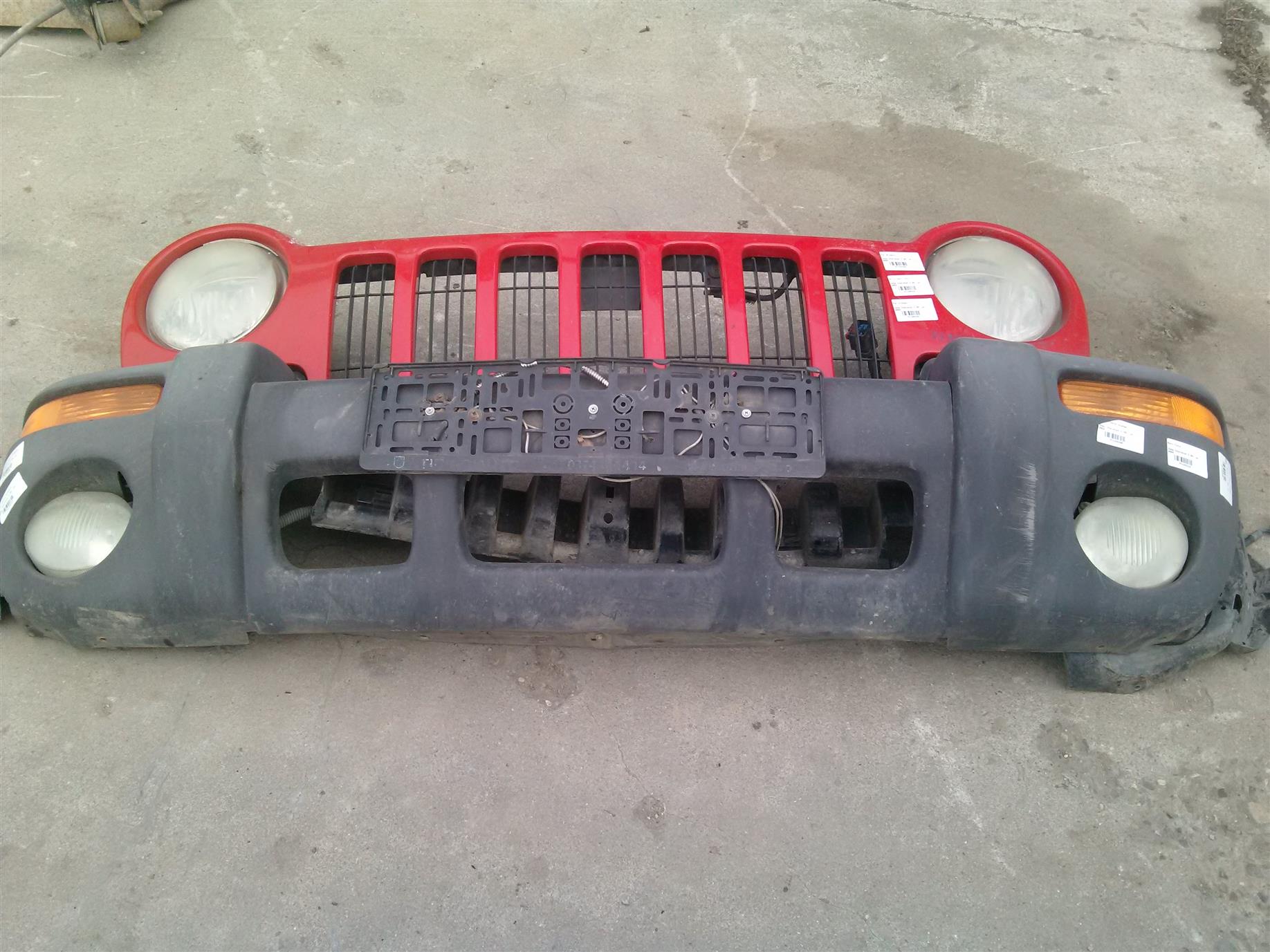 Proiector ceata stanga Jeep Cherokee 2.8D, an 2004