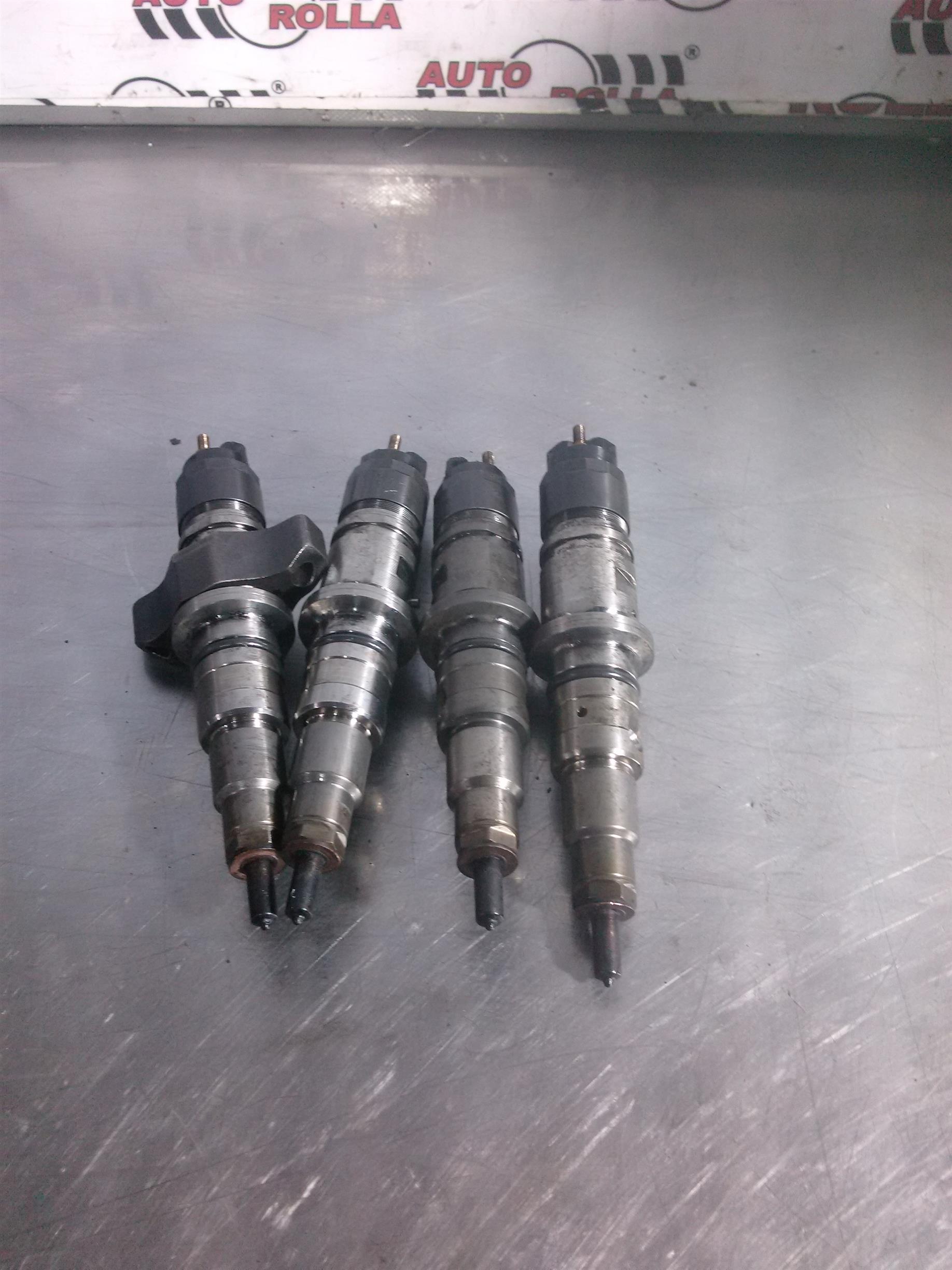 Injectoare 4 buc Iveco Eurocargo 75E17 , an 2005